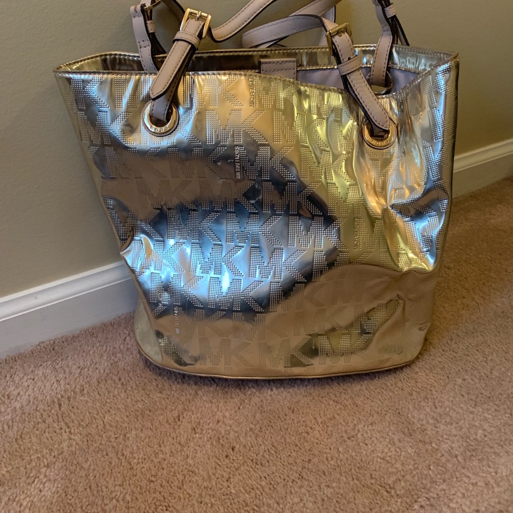 Like new gold Michael Kors bag